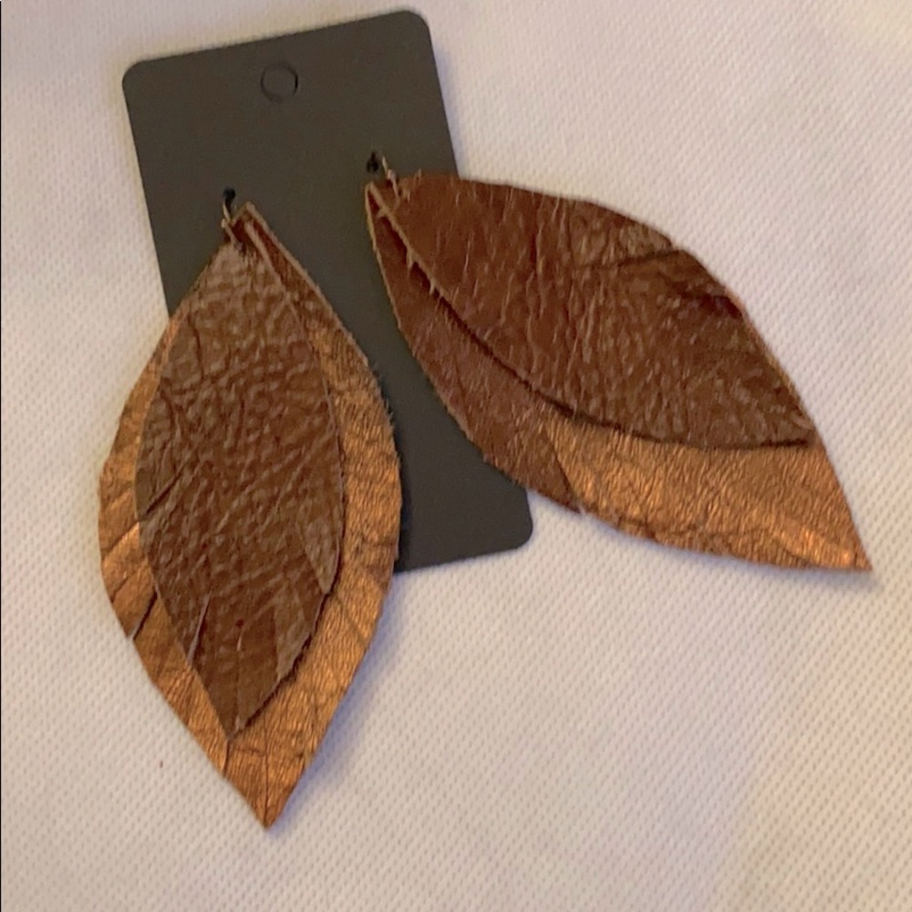 Leather feather earring! Hand cut and painted